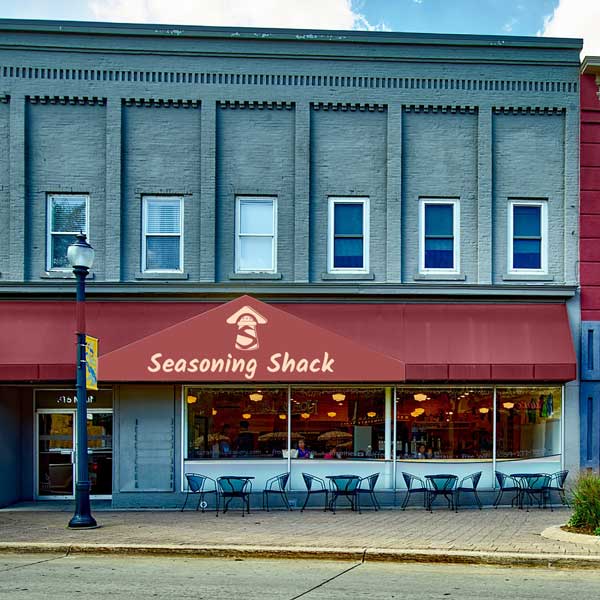 Store front of our Annex location with a red canopy