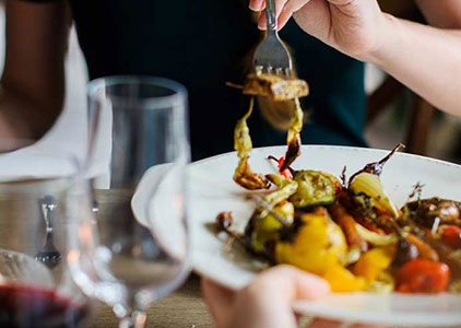 woman eating pasta