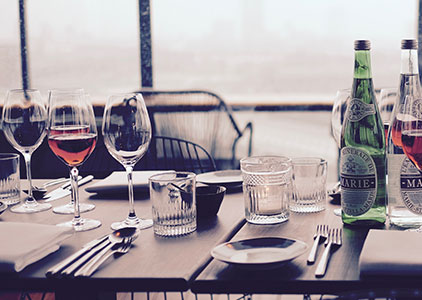 restaurant interior with liquor bottles on table