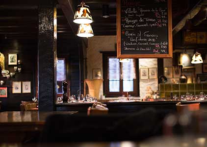 restaurant interior with chalkboard menu